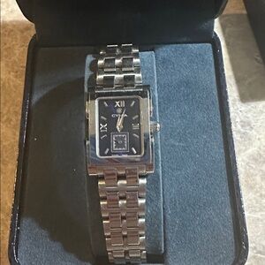 Chic Cyma Silver and Blue Women's Watch moving hands while wearing